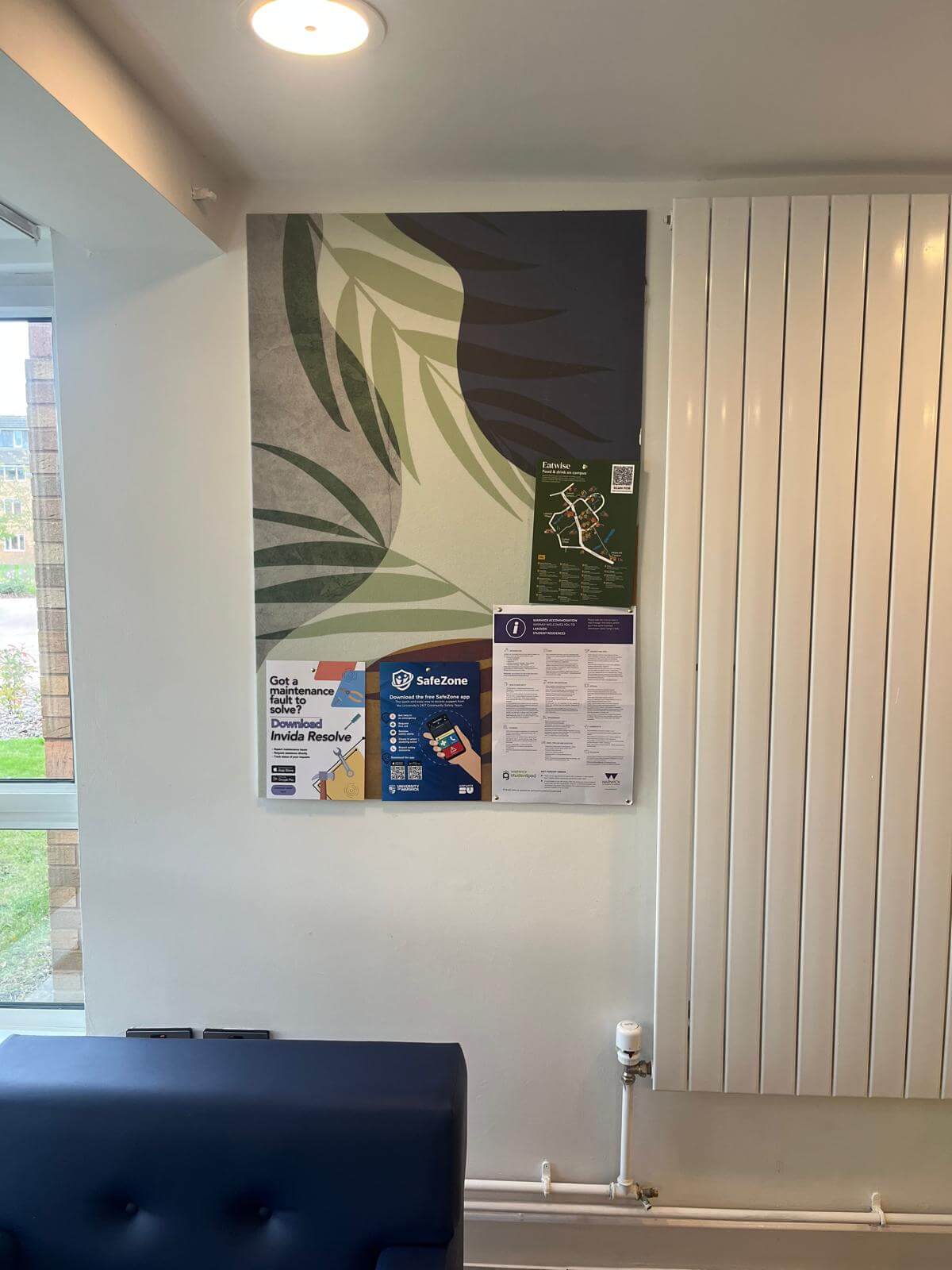 Large format signage display in a modern workspace